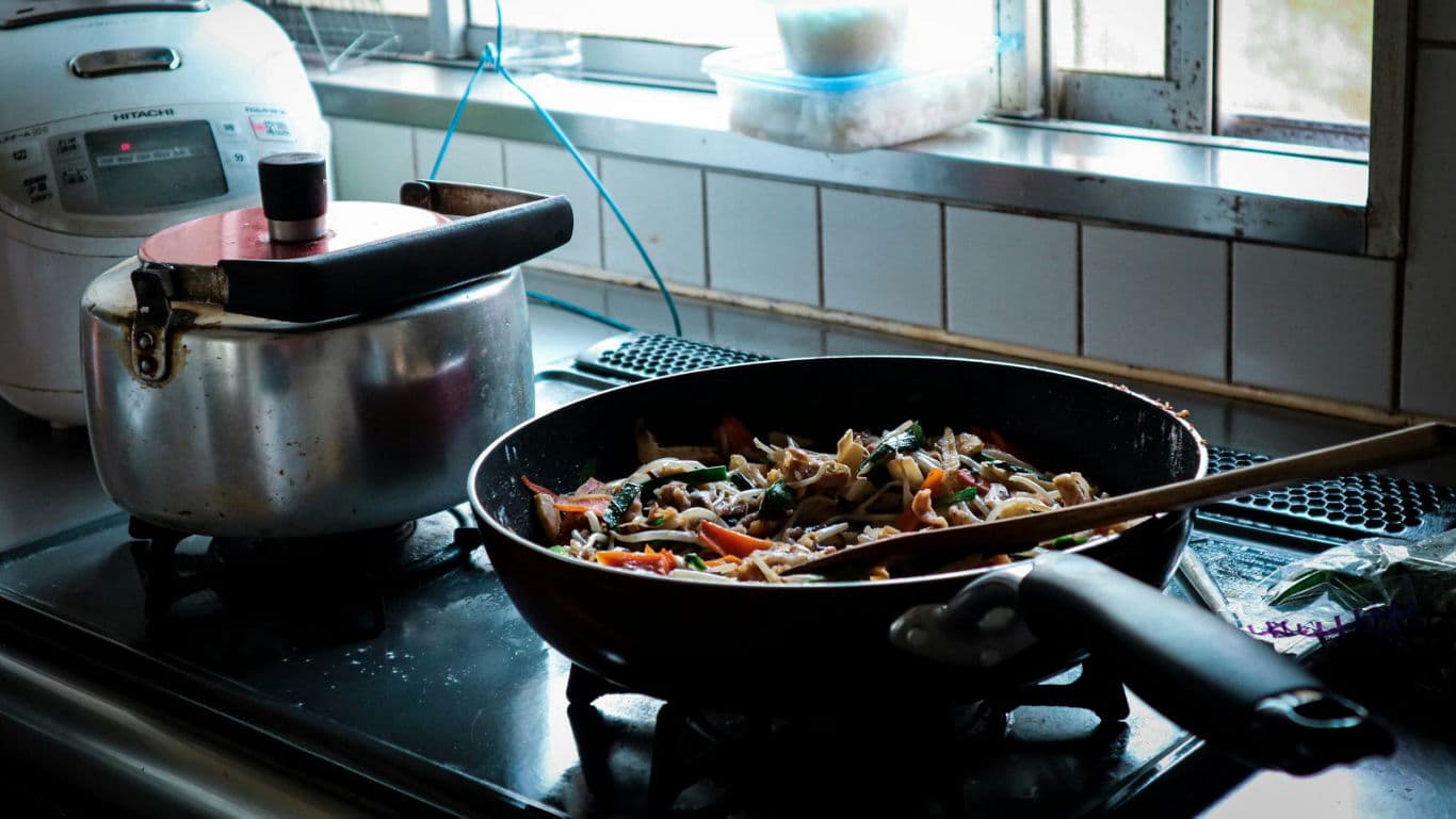 Home kitchen stir fry in frying pan