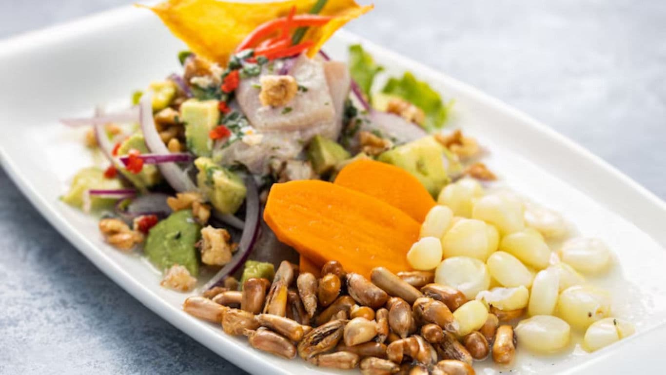 Colorful ceviche plate with corn and vegetables