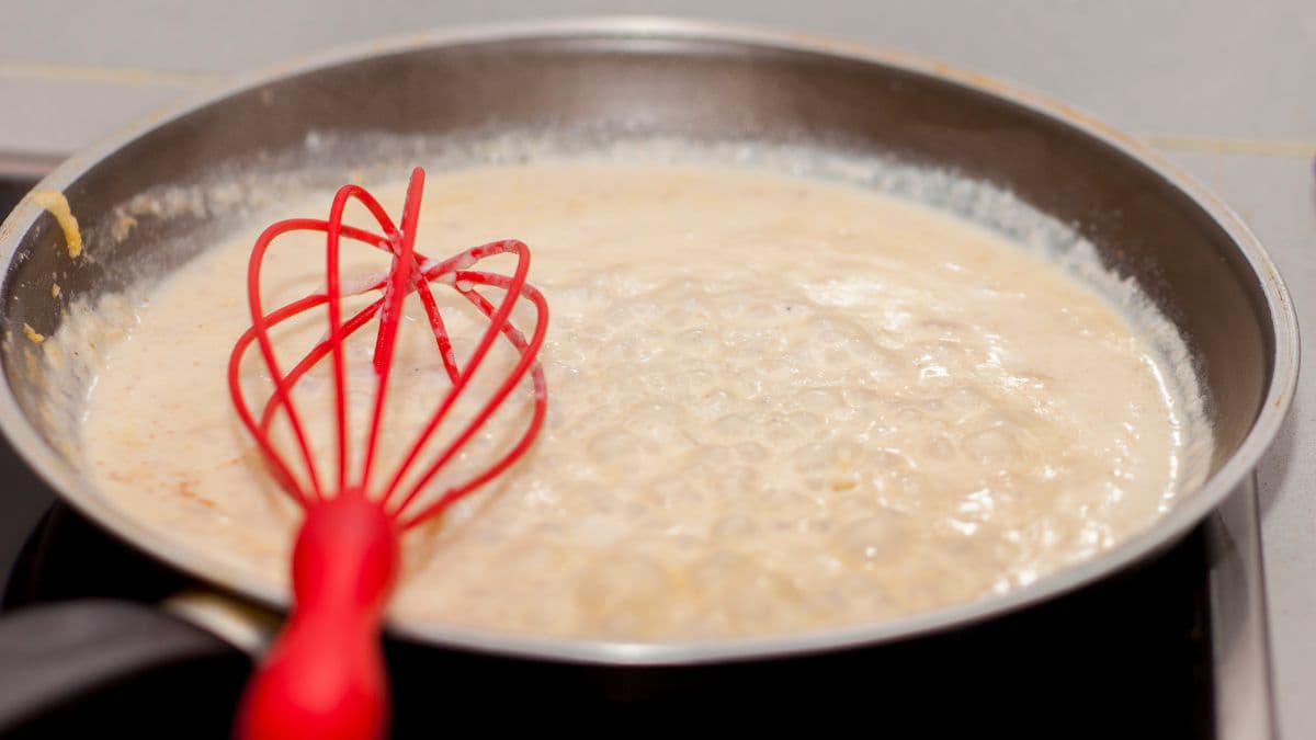 Pan of khapli atta bechamel sauce