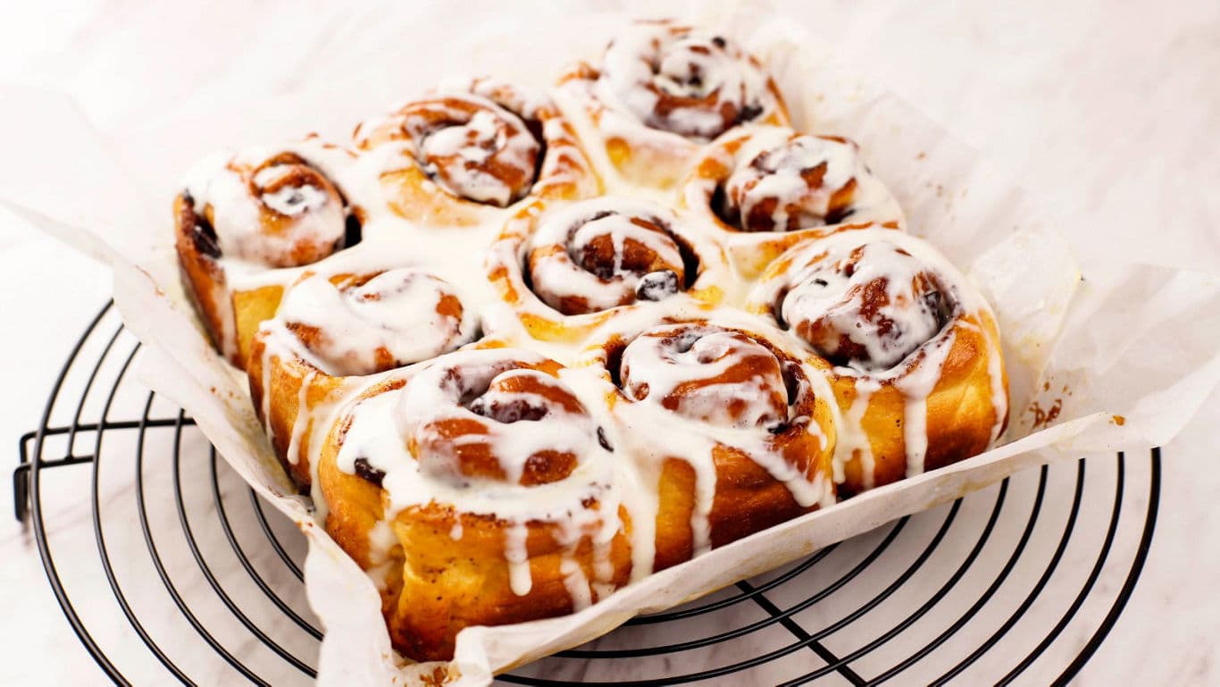 Freshly baked cinnamon rolls with icing