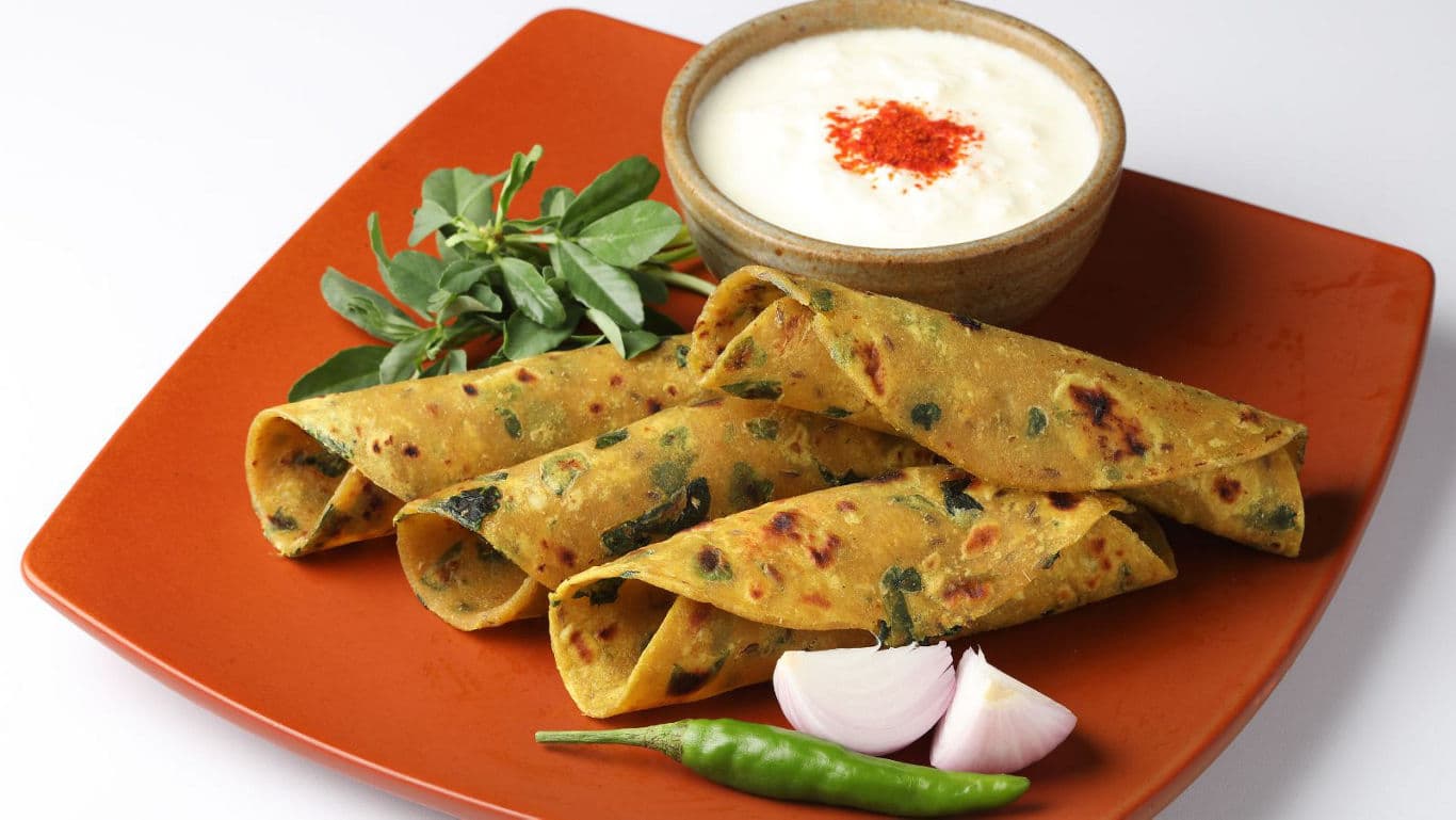 Indian flatbread rolls with yogurt dip
