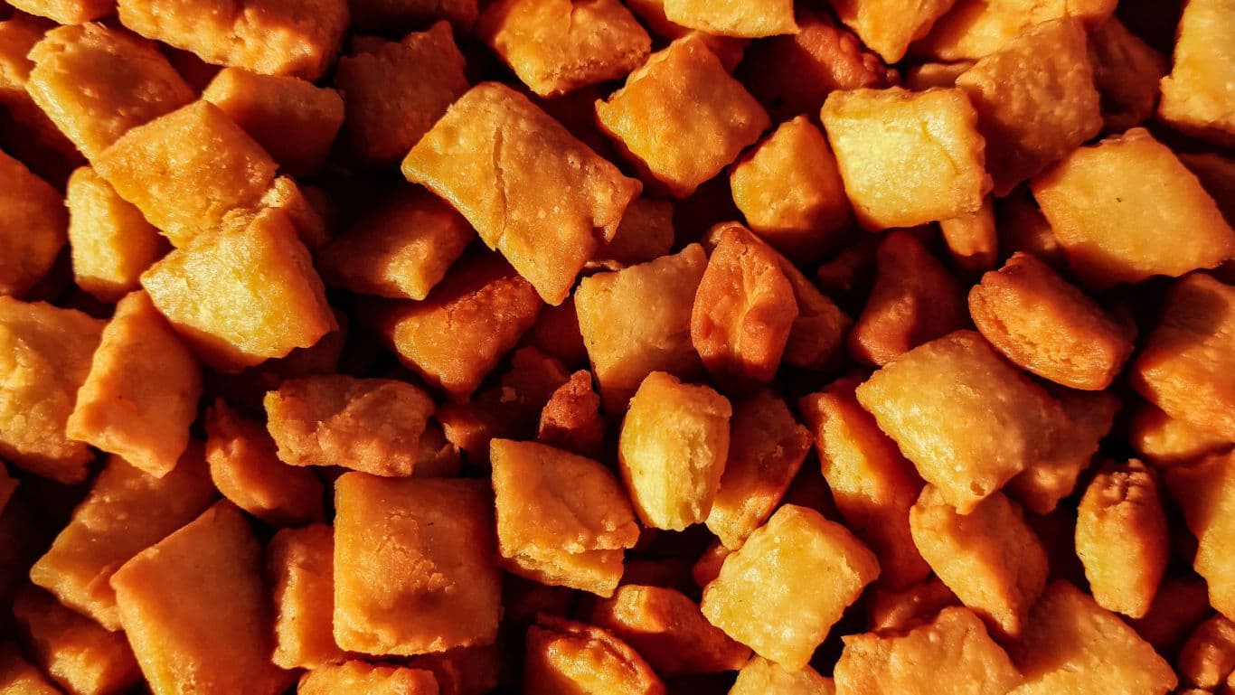 Close-up of crispy golden fried snacks