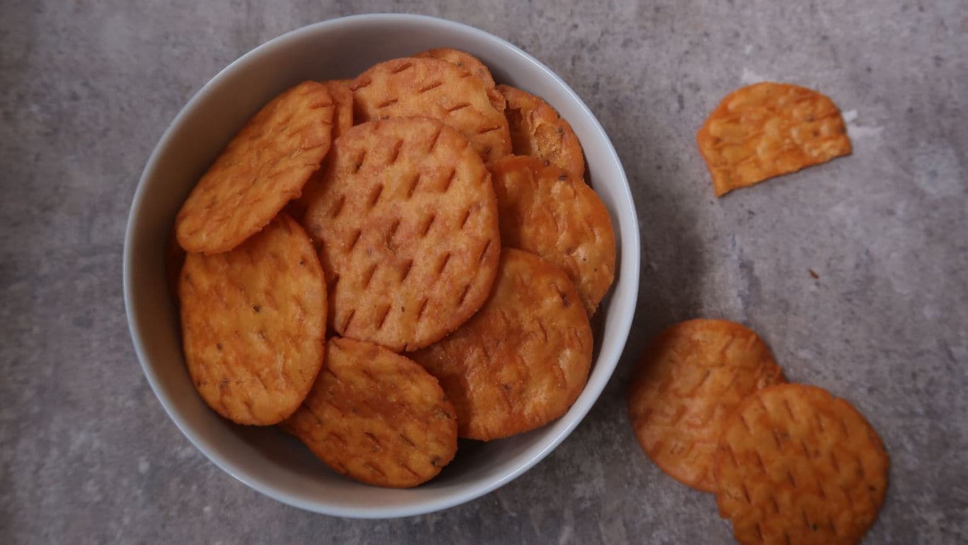 Bowl of crispy round savory crackers