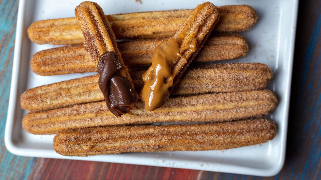 Cinnamon sugar churros with chocolate and caramel