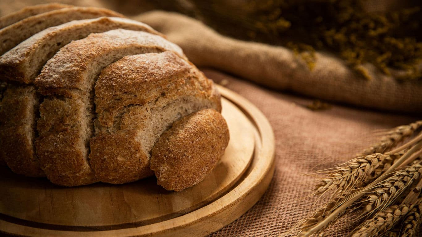 Rustic Whole Wheat Bread on Wooden Board