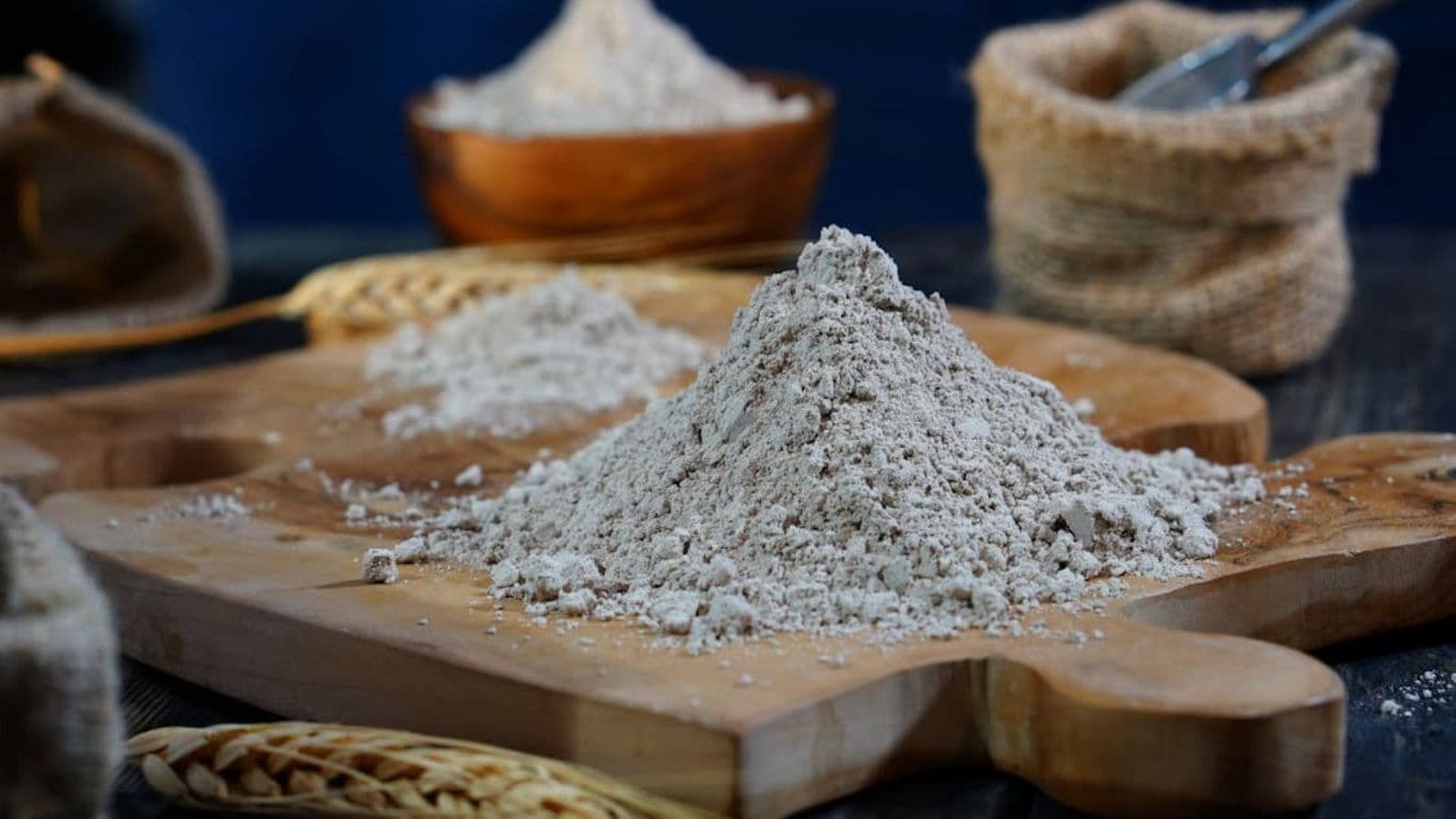 flour on a wooden board