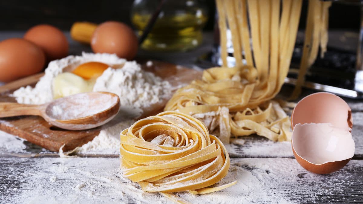 eggs, flour, and noodles on a table
