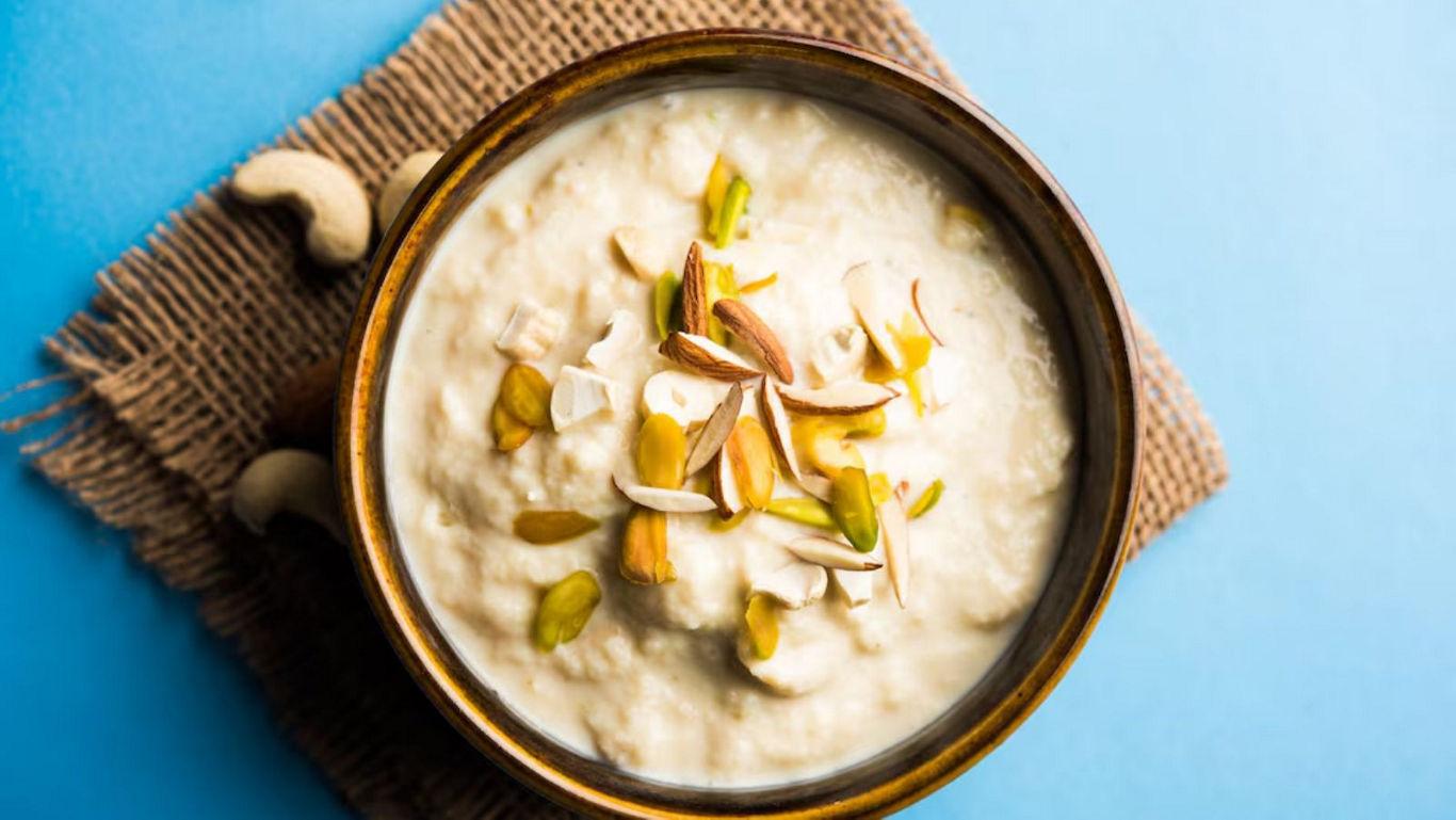 Creamy dessert bowl with nuts garnish