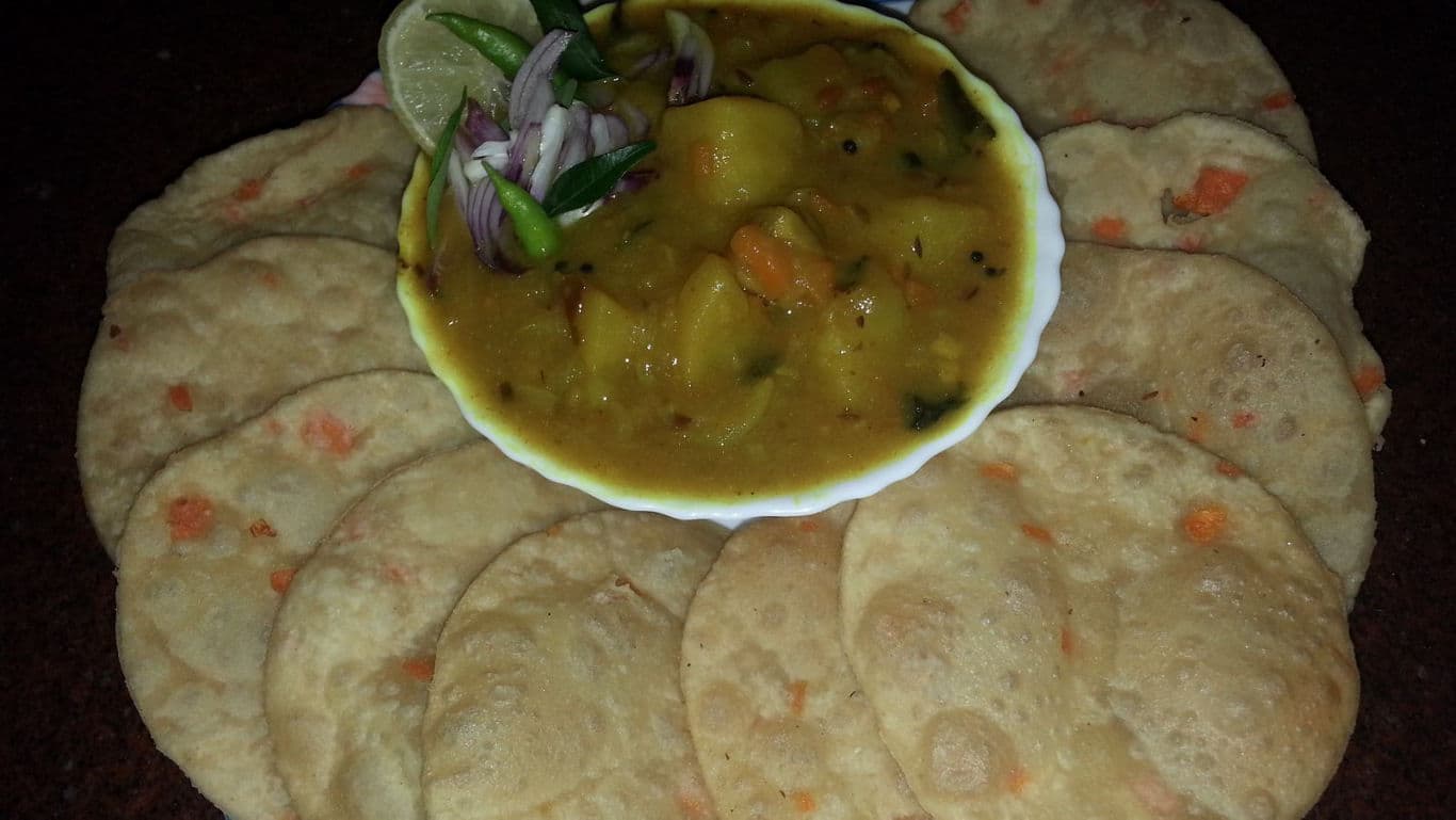 Indian puri bread with potato curry