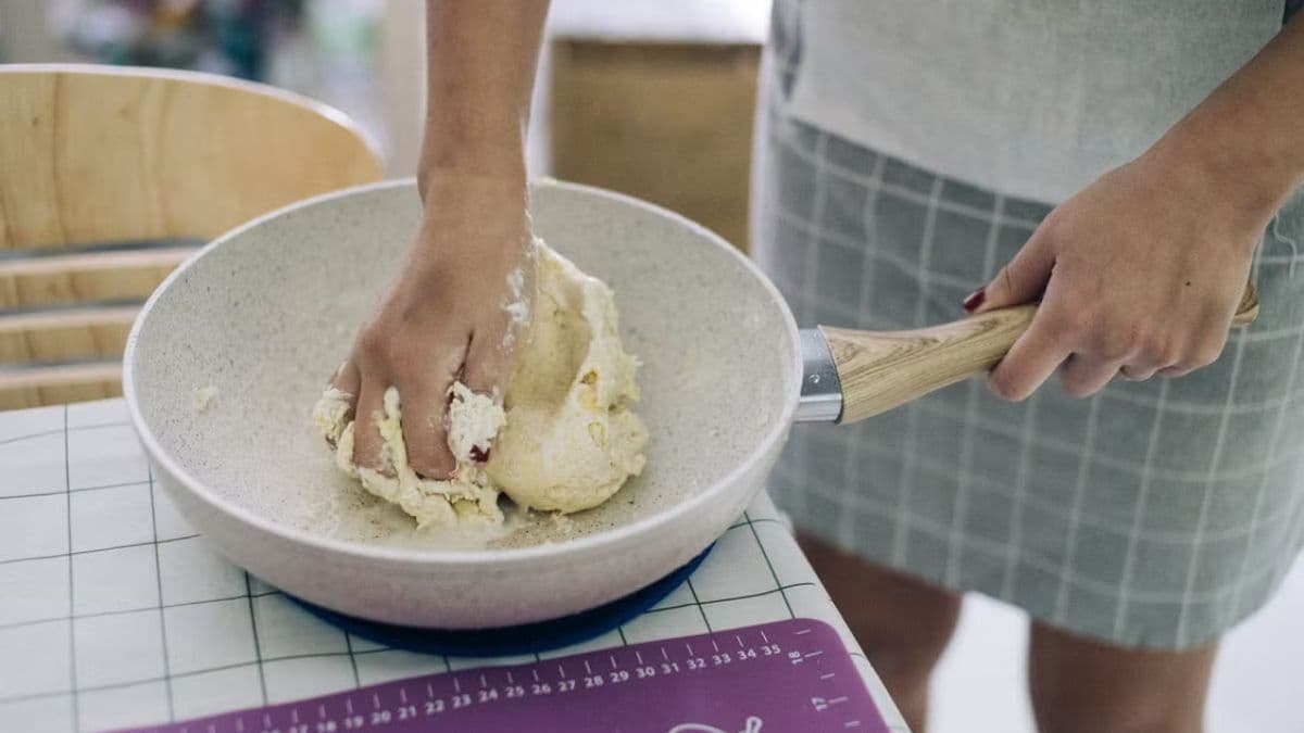 Khapli wheat pizza dough being kneaded