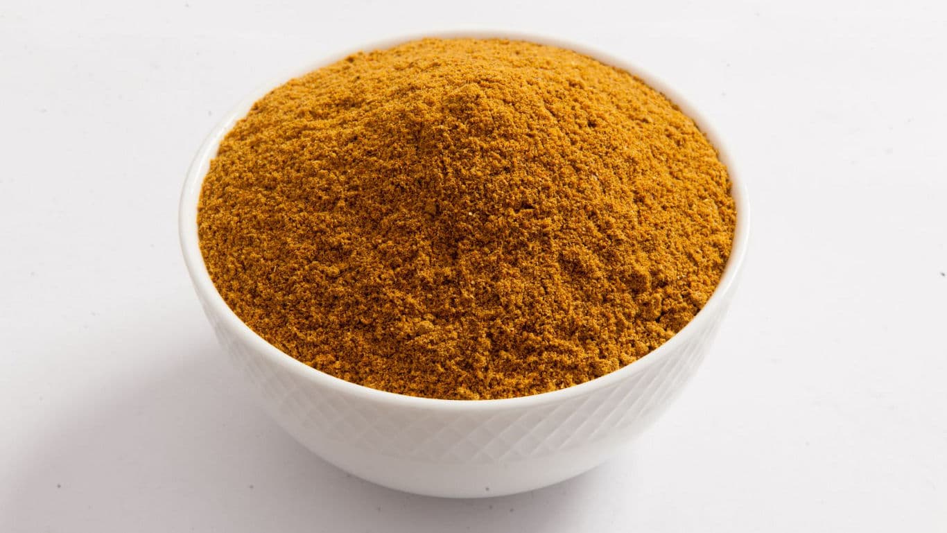 White bowl filled with ground spice