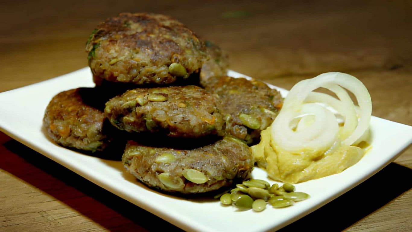 Vegetable Patties with Onion and Mustard Garnish