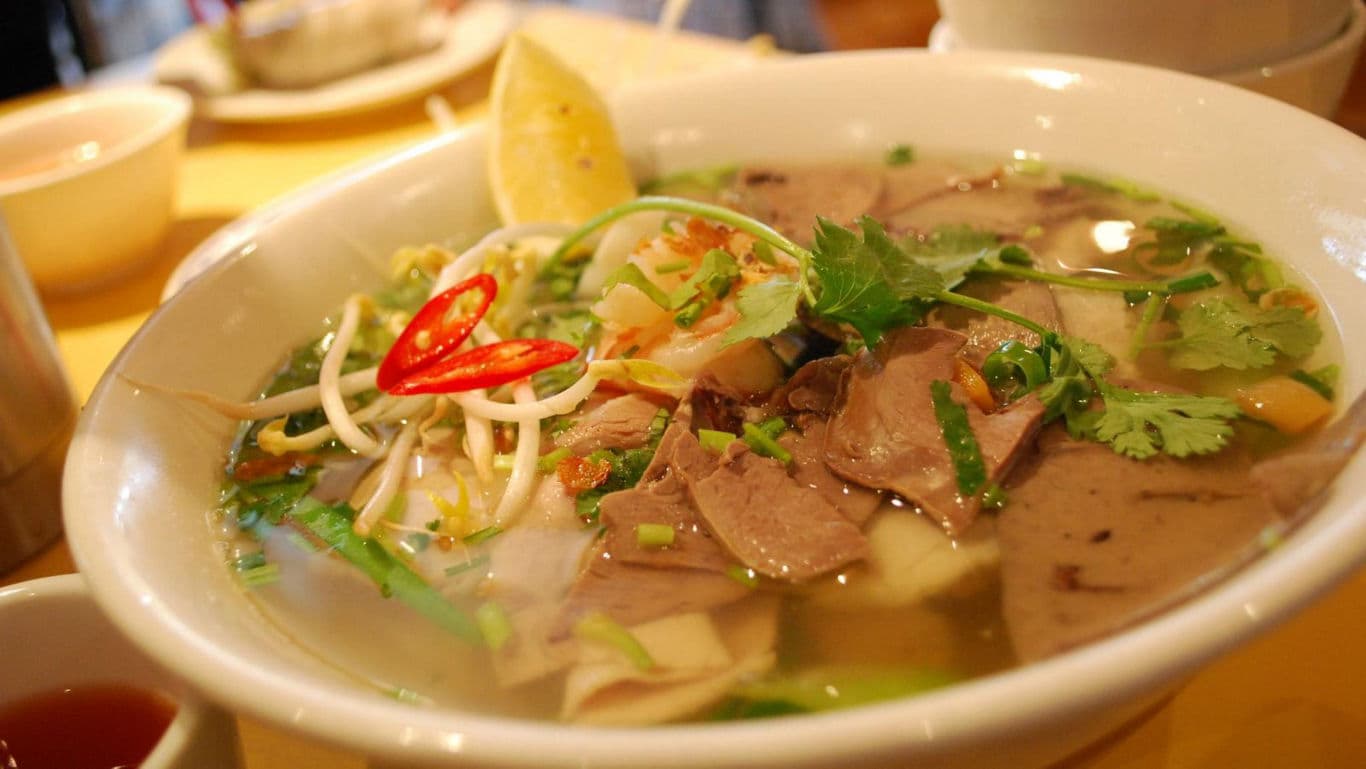 Vietnamese Pho Noodle Soup with Fresh Herbs