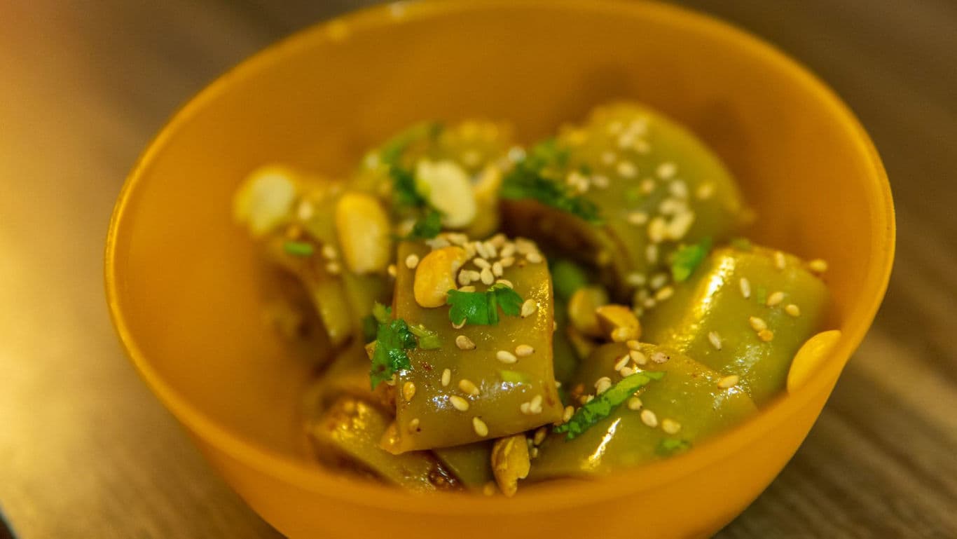 Spicy rice noodle salad with peanuts and sesame seeds