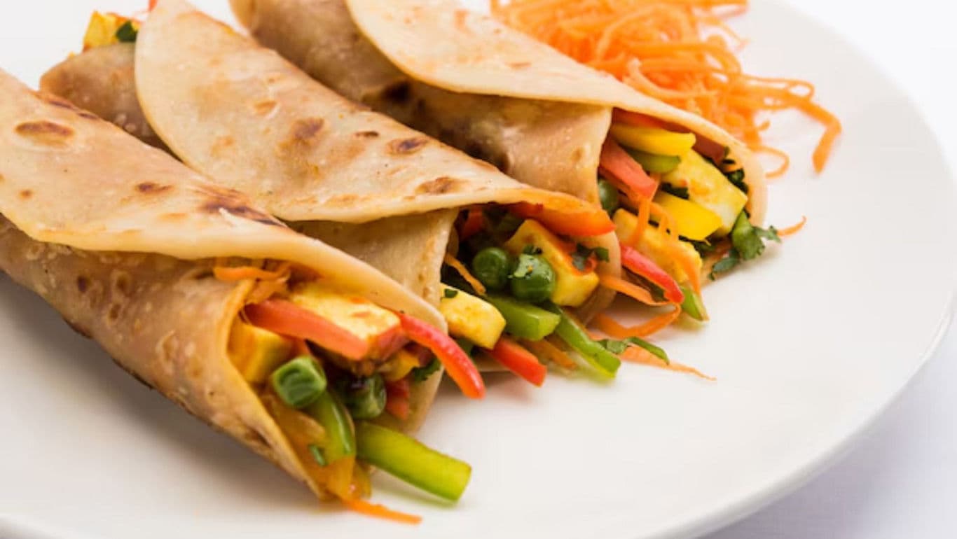 Vegetable wraps with colorful fresh filling on plate