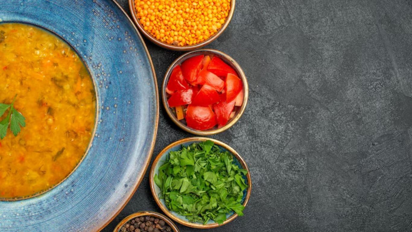 Colorful lentil soup with fresh ingredients