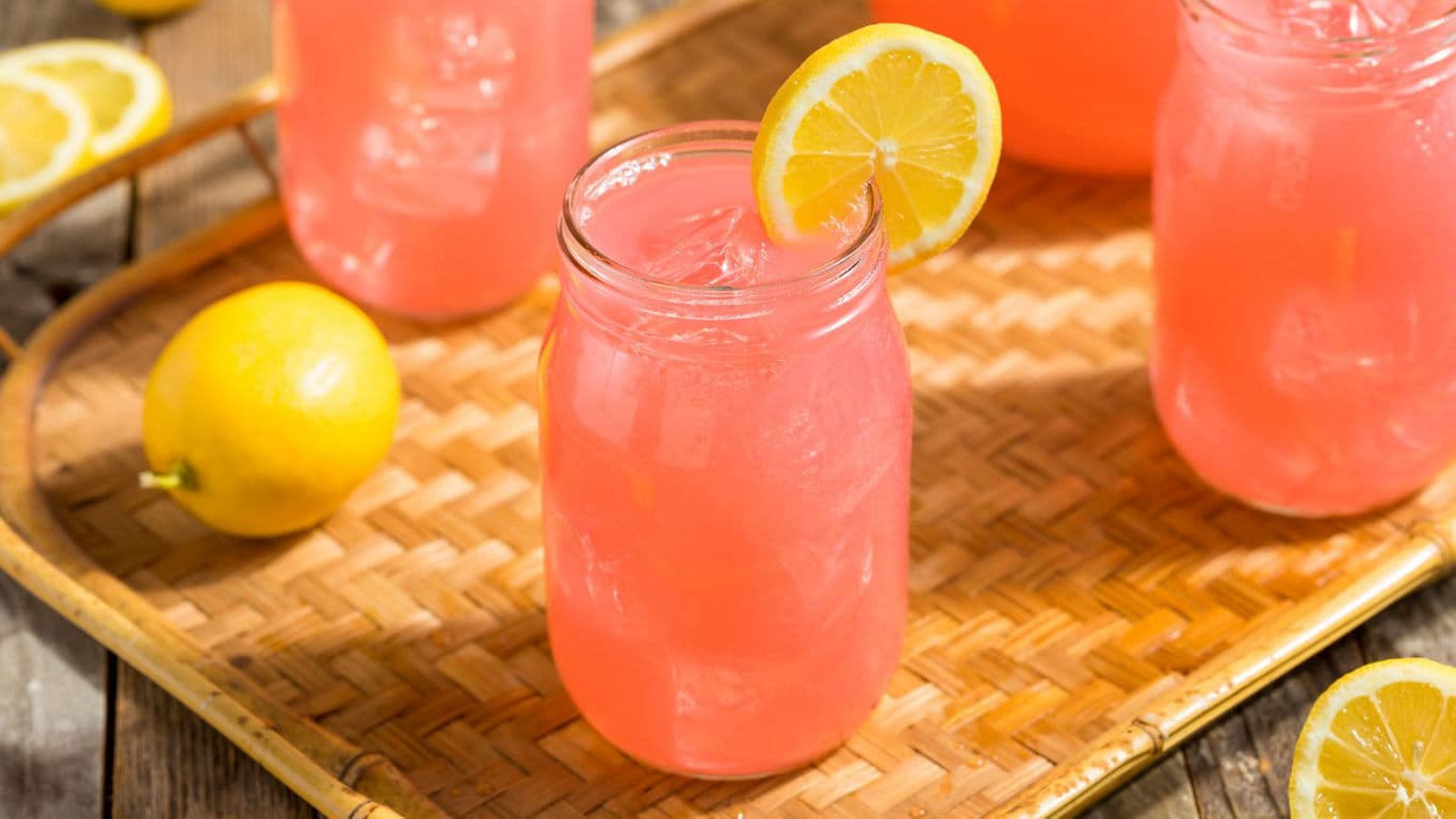 Refreshing Pink Lemonade in Mason Jars with Lemons