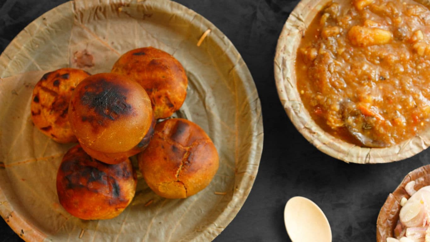 Traditional Indian Litti Chokha Served on Leaf Plates