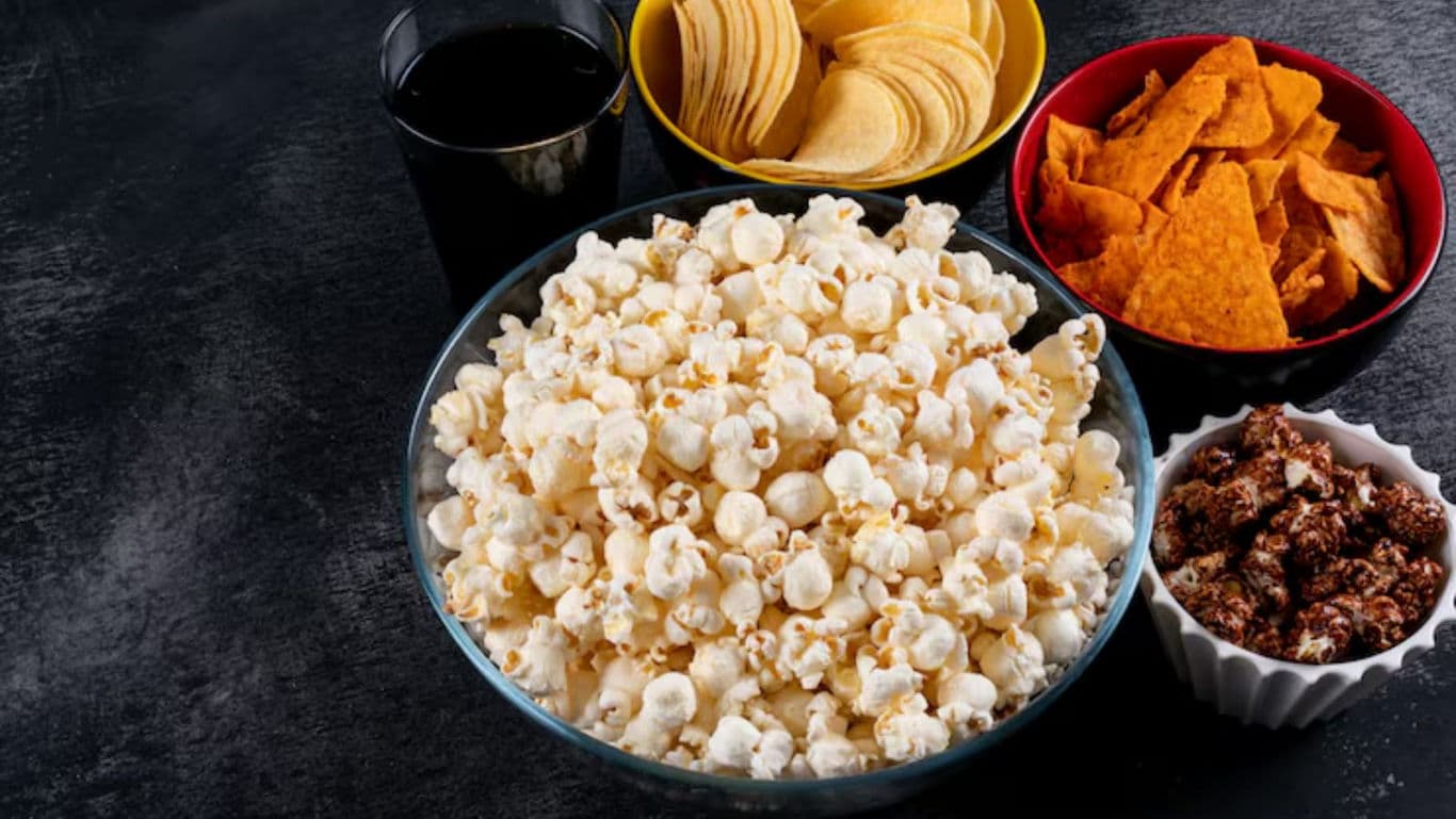 Assorted Snack Bowls with Popcorn and Chips