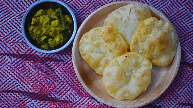 khapli-wheat-bengali-style-luchi-for-traditional-bengali-meals-thumbnail