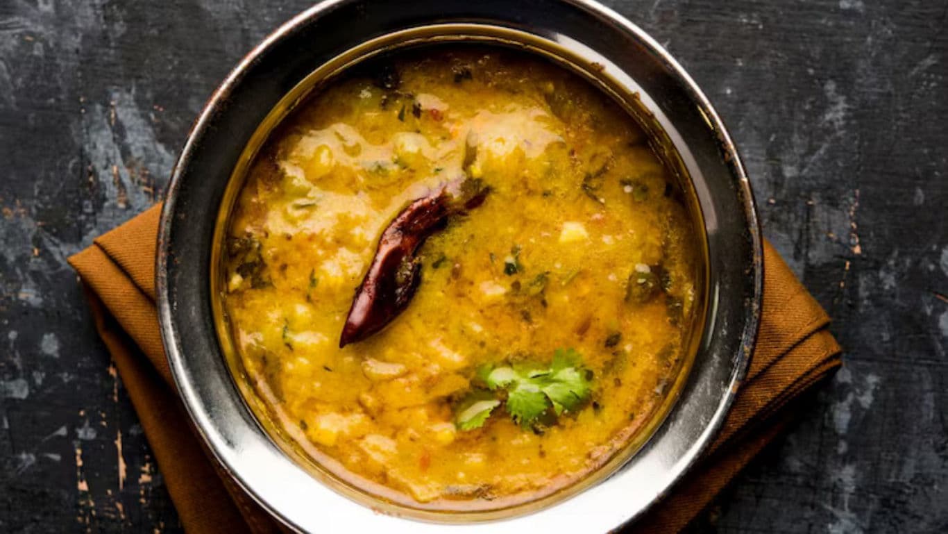Smoky dal tadka with coriander and red chilli.