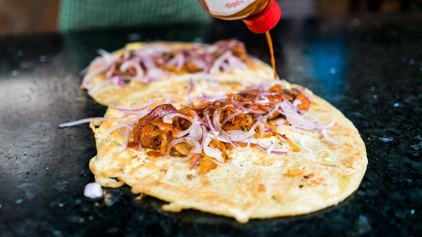 Kolkata biryani with raita on the side