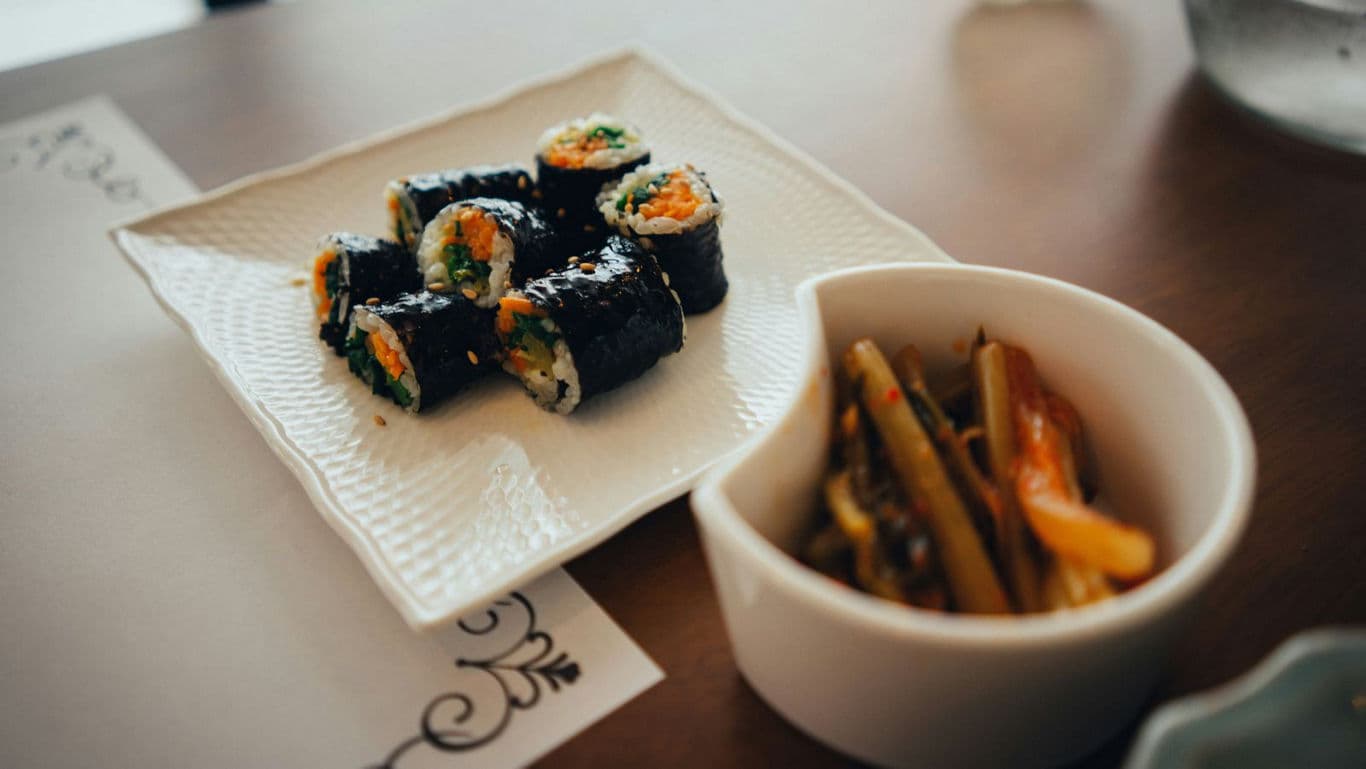 Sliced kimbap on a plate.