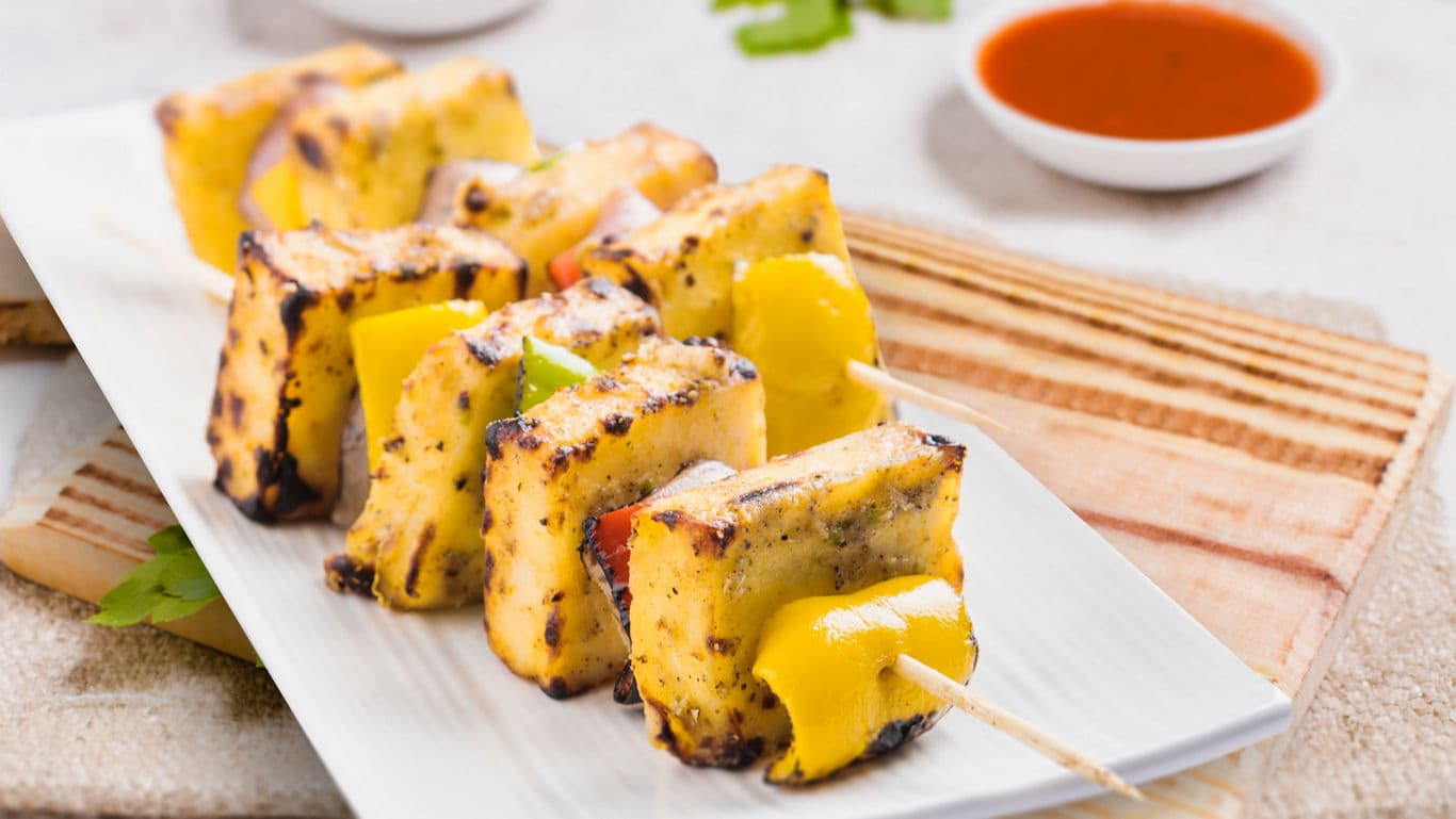 Colourful spread of seven paneer dishes