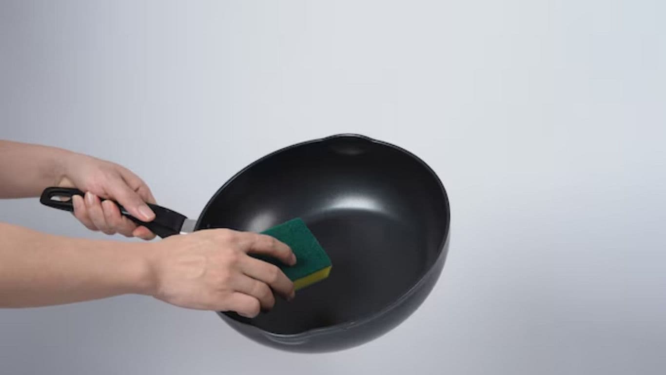 Cleaning a black nonstick frying pan