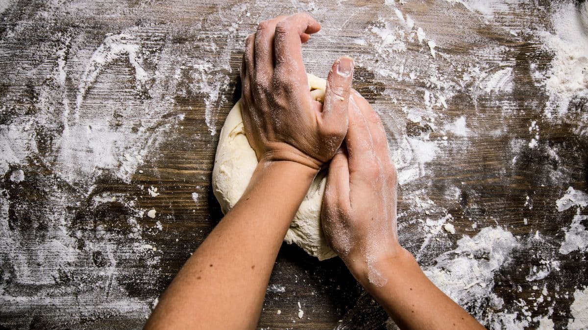 Person kneading dough