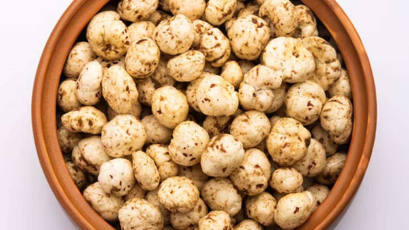 Roasted makhana fox nuts in brown ceramic bowl