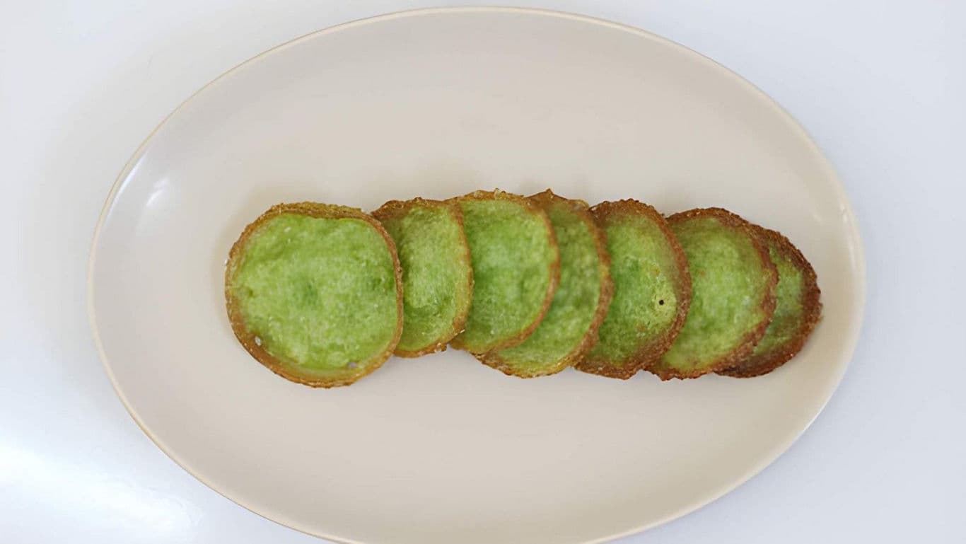 Green Indonesian Serabi Pancakes Arranged on Plate