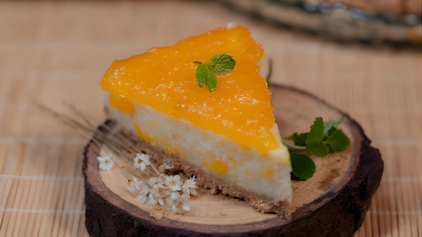 Slice of creamy orange fruit cheesecake
