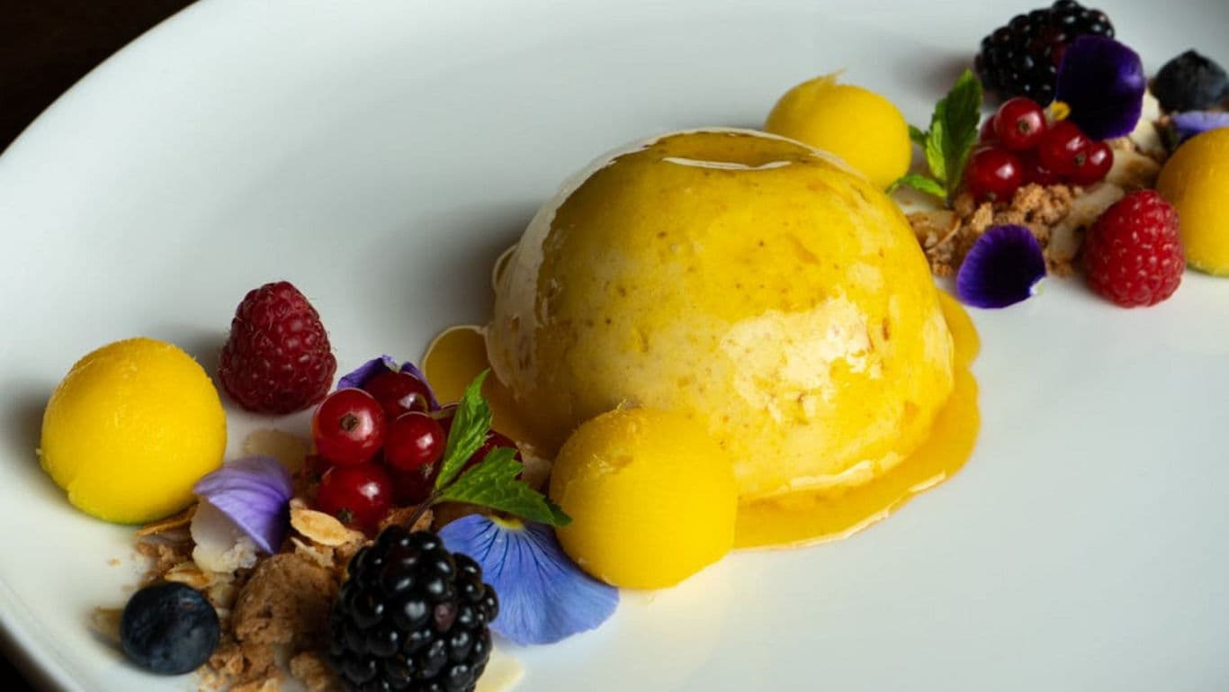 Gourmet plated dessert with fresh berries