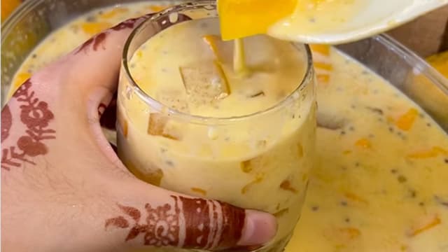 Glass bowl filled with mango sago 