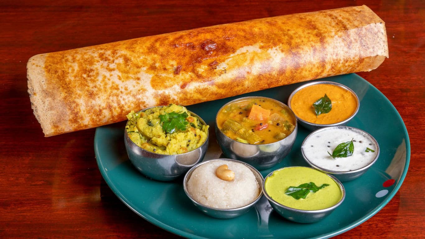 South Indian dosa with assorted chutneys and sambar