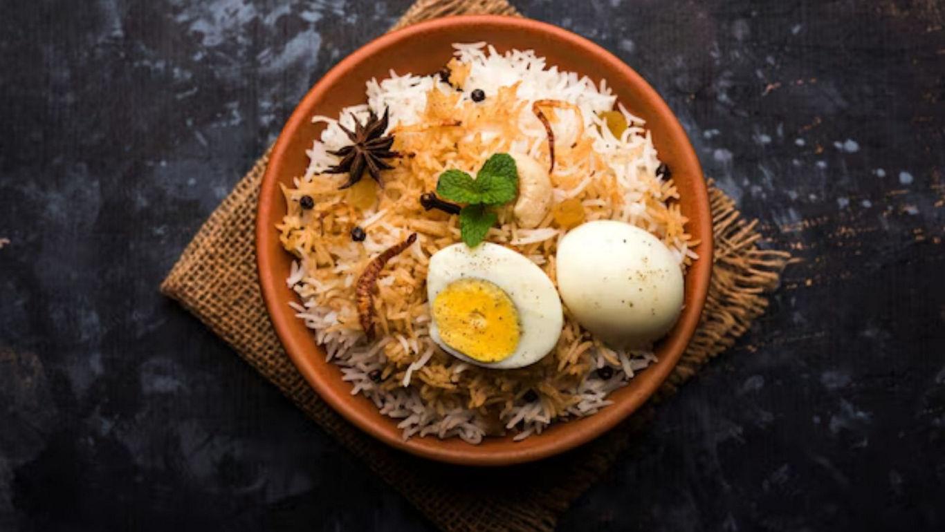 Egg biryani in rustic clay bowl