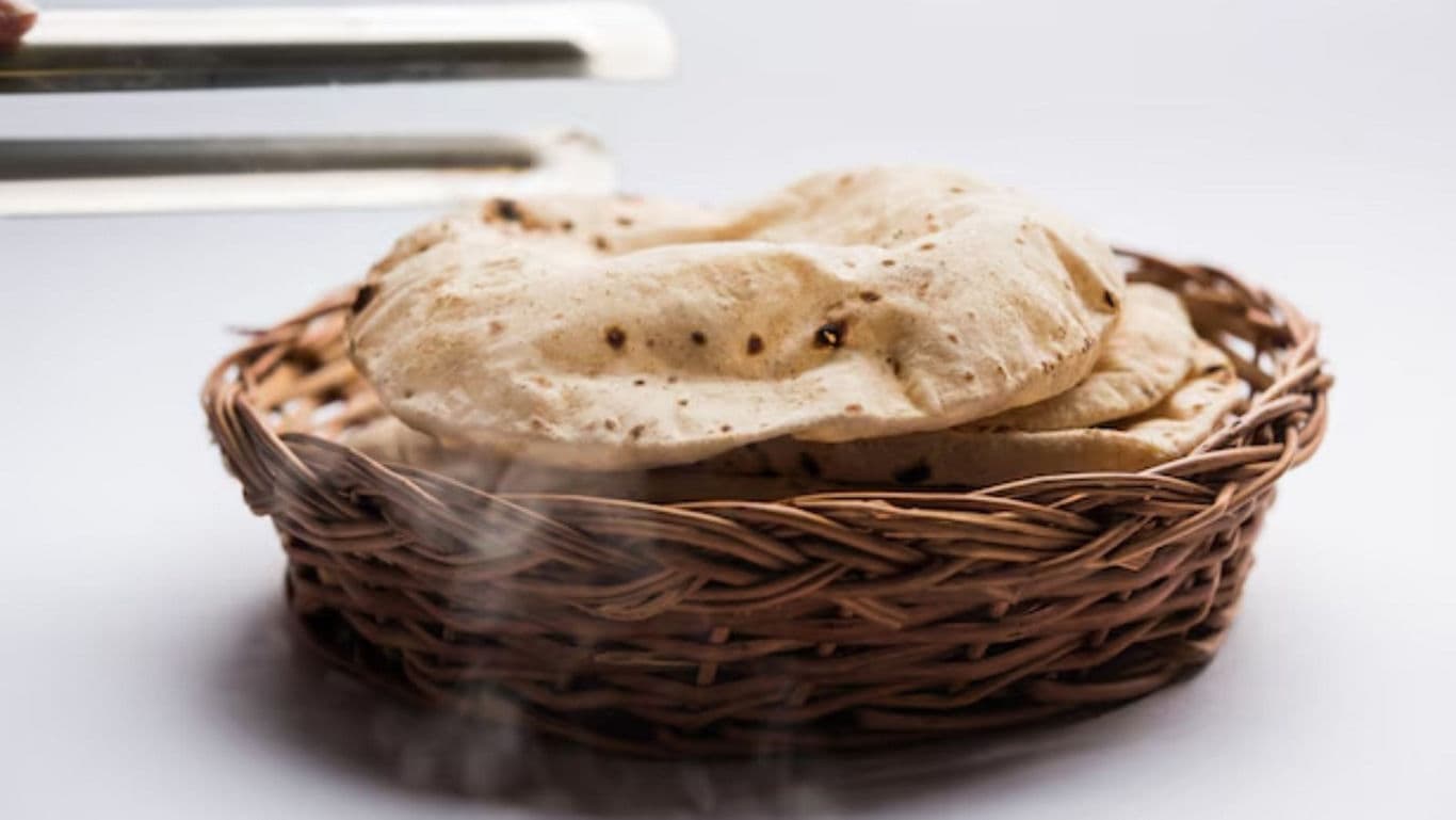 Freshly made Indian roti in woven basket