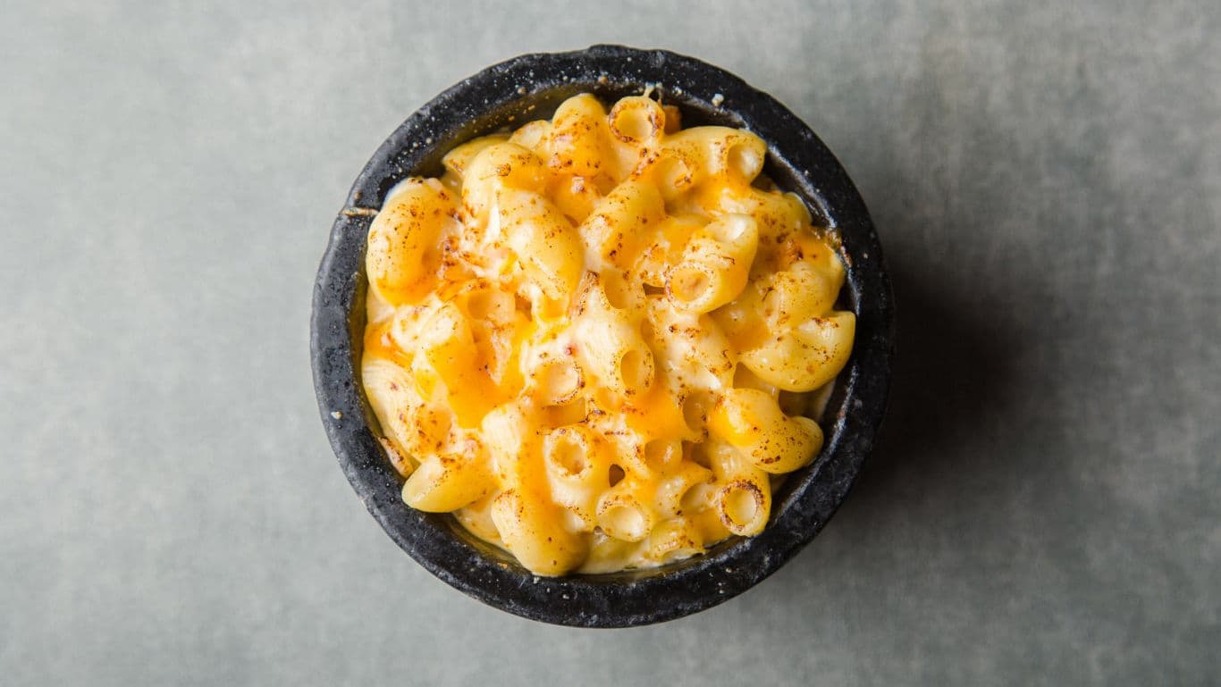 Creamy macaroni and cheese in stone bowl