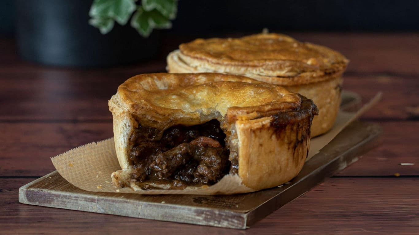 Savory Meat Pie on Wooden Board
