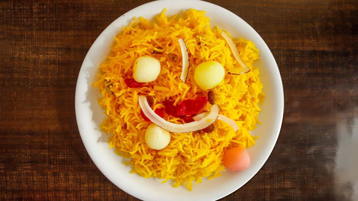 Smiley Face on Yellow Rice Dish