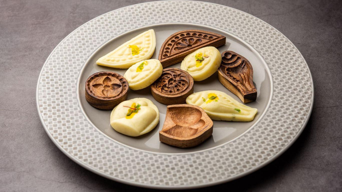 Kolkata biryani with raita on the side