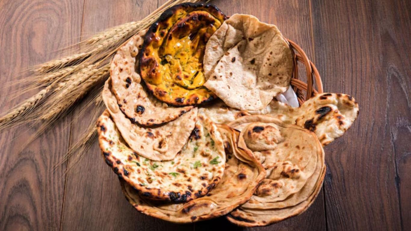 Assorted Indian flatbreads in rustic setting