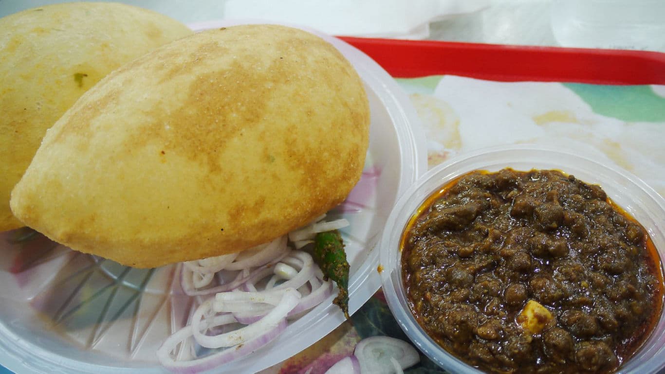 Indian fried bread with spicy curry