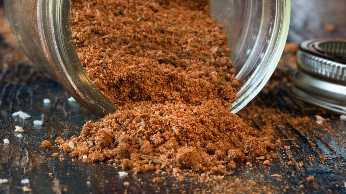 Spice rub falling from a jar