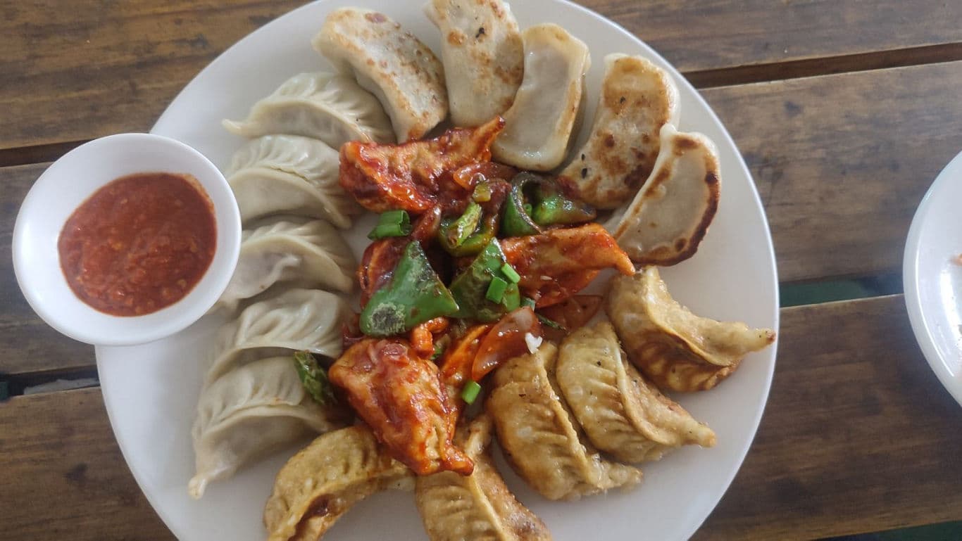 Assorted dumplings with spicy dipping sauce