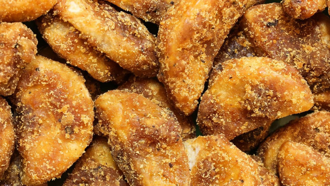 Close-up of crispy breaded chicken pieces