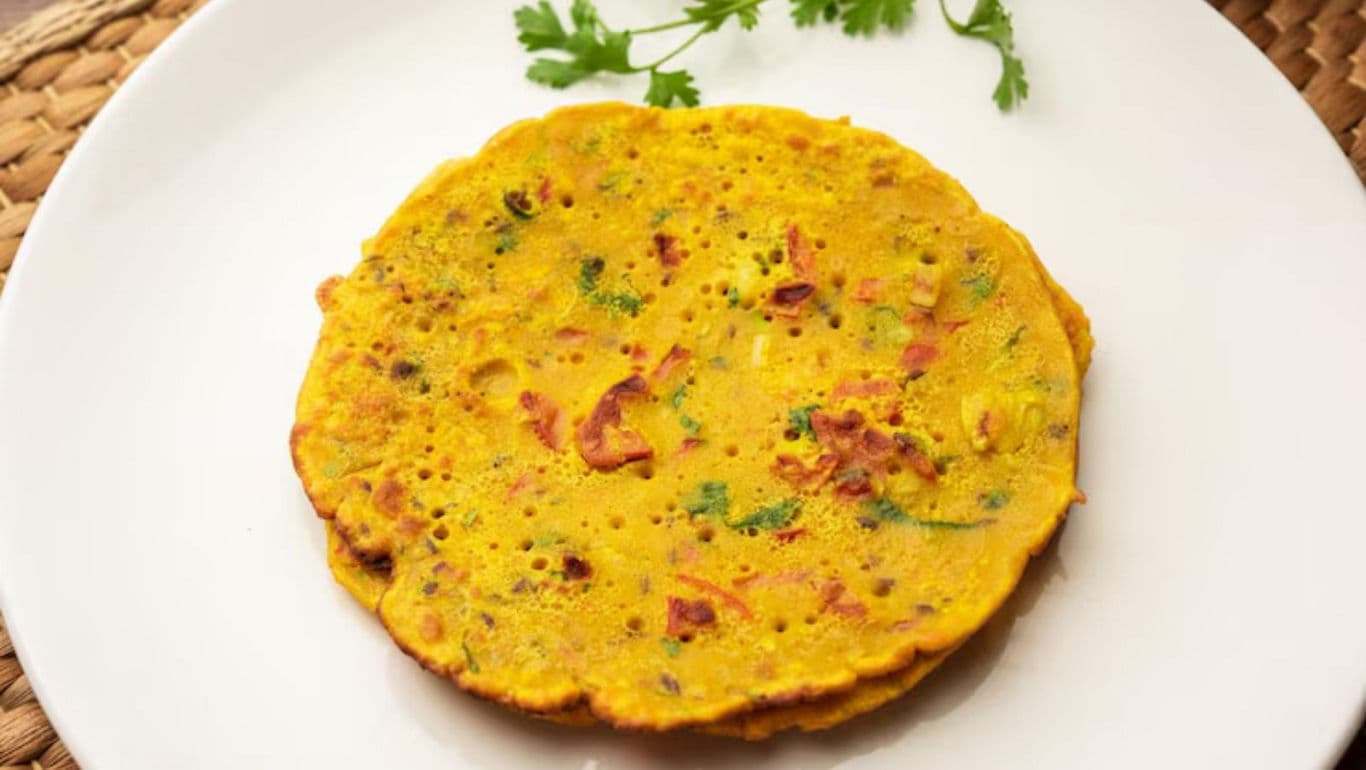 Traditional Besan Chilla Served on White Plate