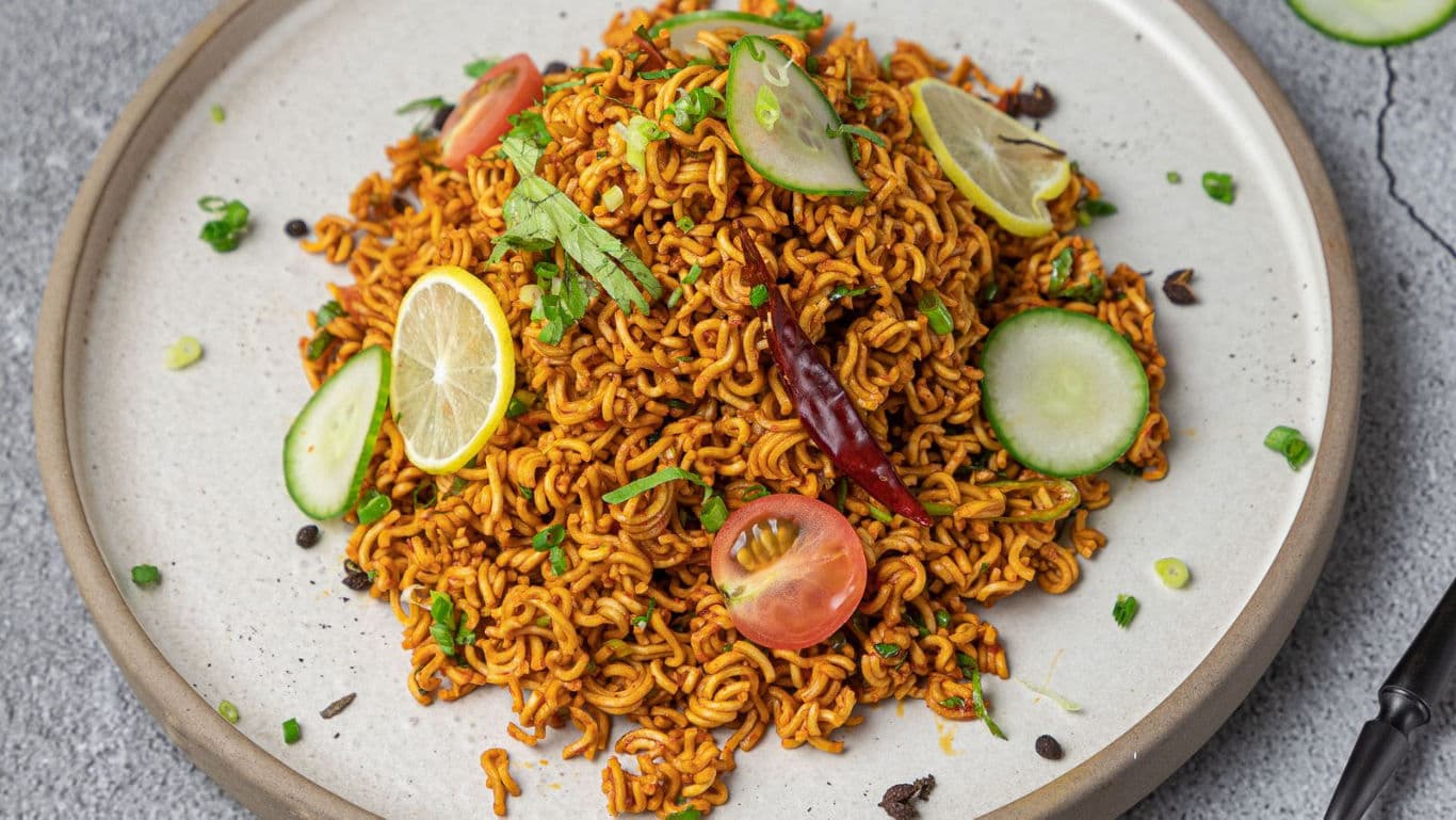 Spicy stir-fried noodles with fresh vegetables