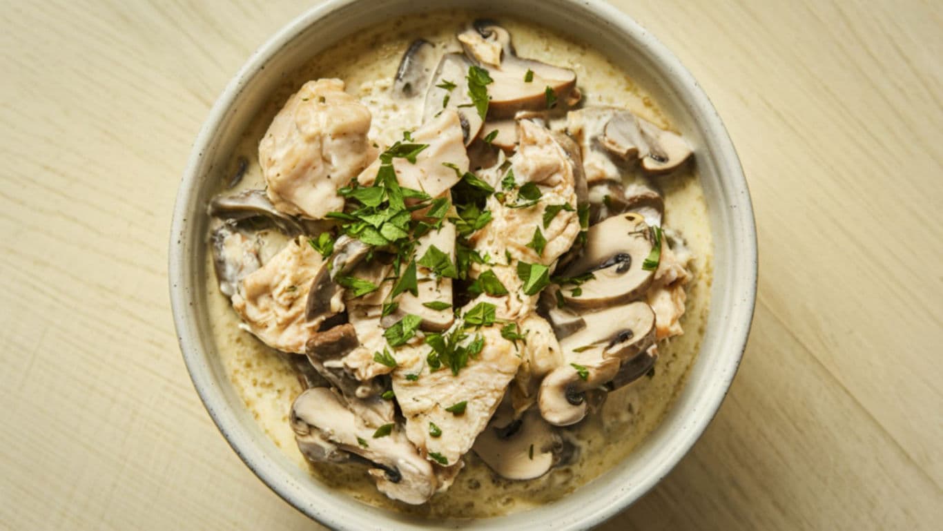 Creamy chicken and mushroom bowl closeup